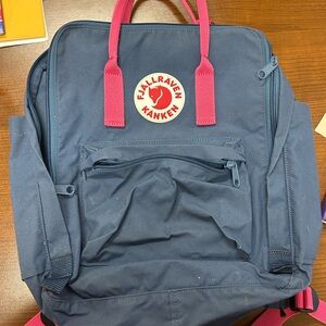 Fjällräven Kanken blue and pink backpack
